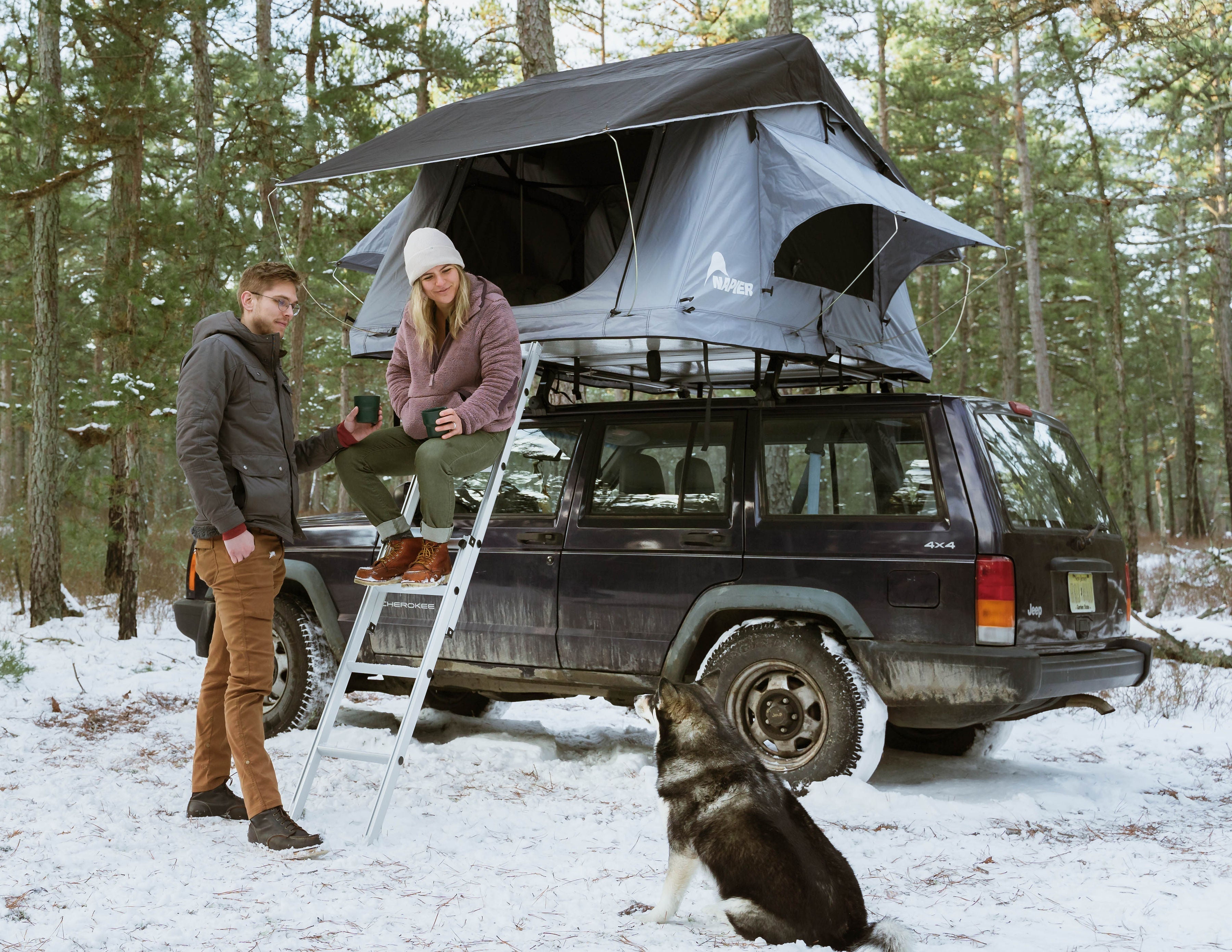 Backcountry Sportsman Napier rooftop tent set up on a vehicle, showing its compact design and weather-resistant fabric.