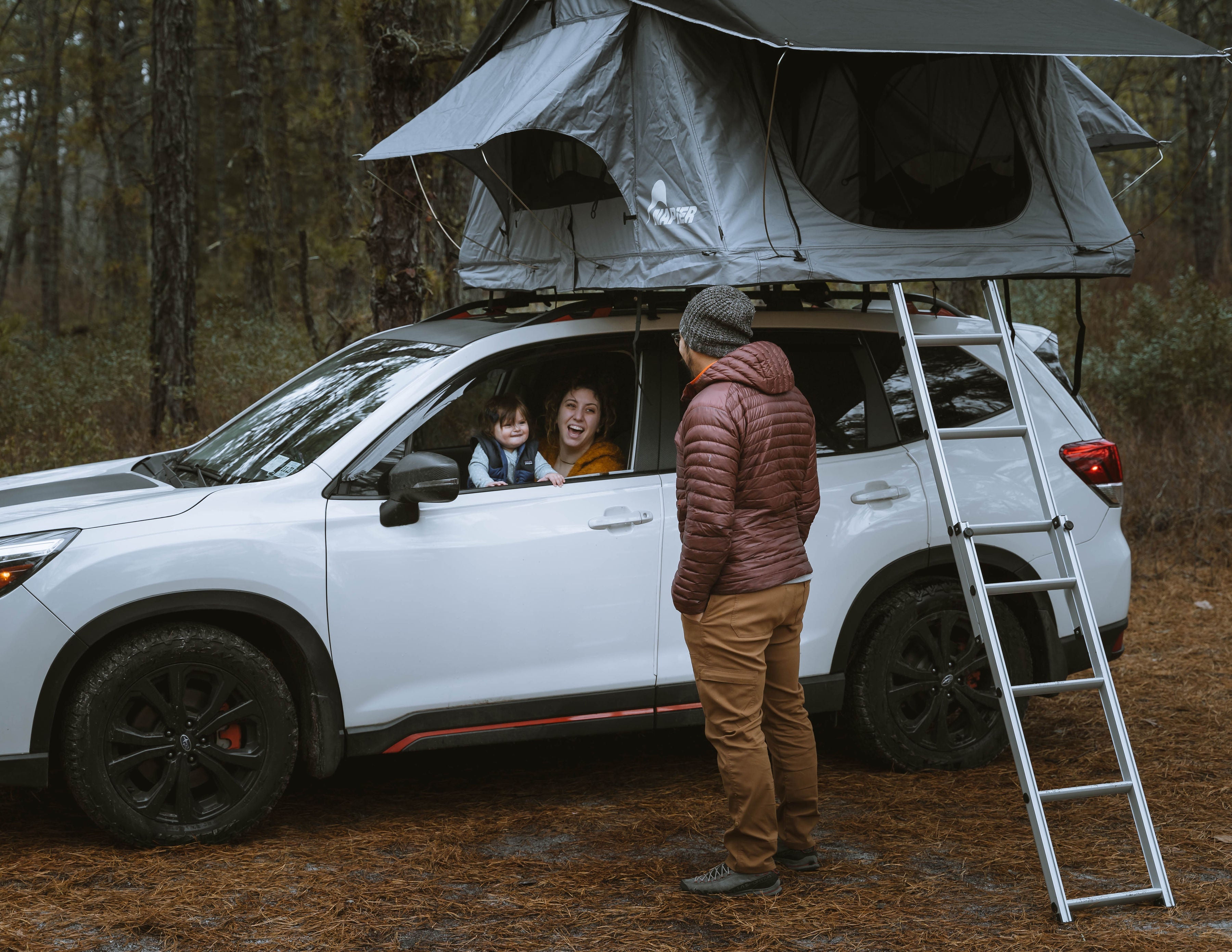Backcountry Sportsman Napier rooftop tent set up on a vehicle, showing its durable fabric and spacious interior for camping adventures.