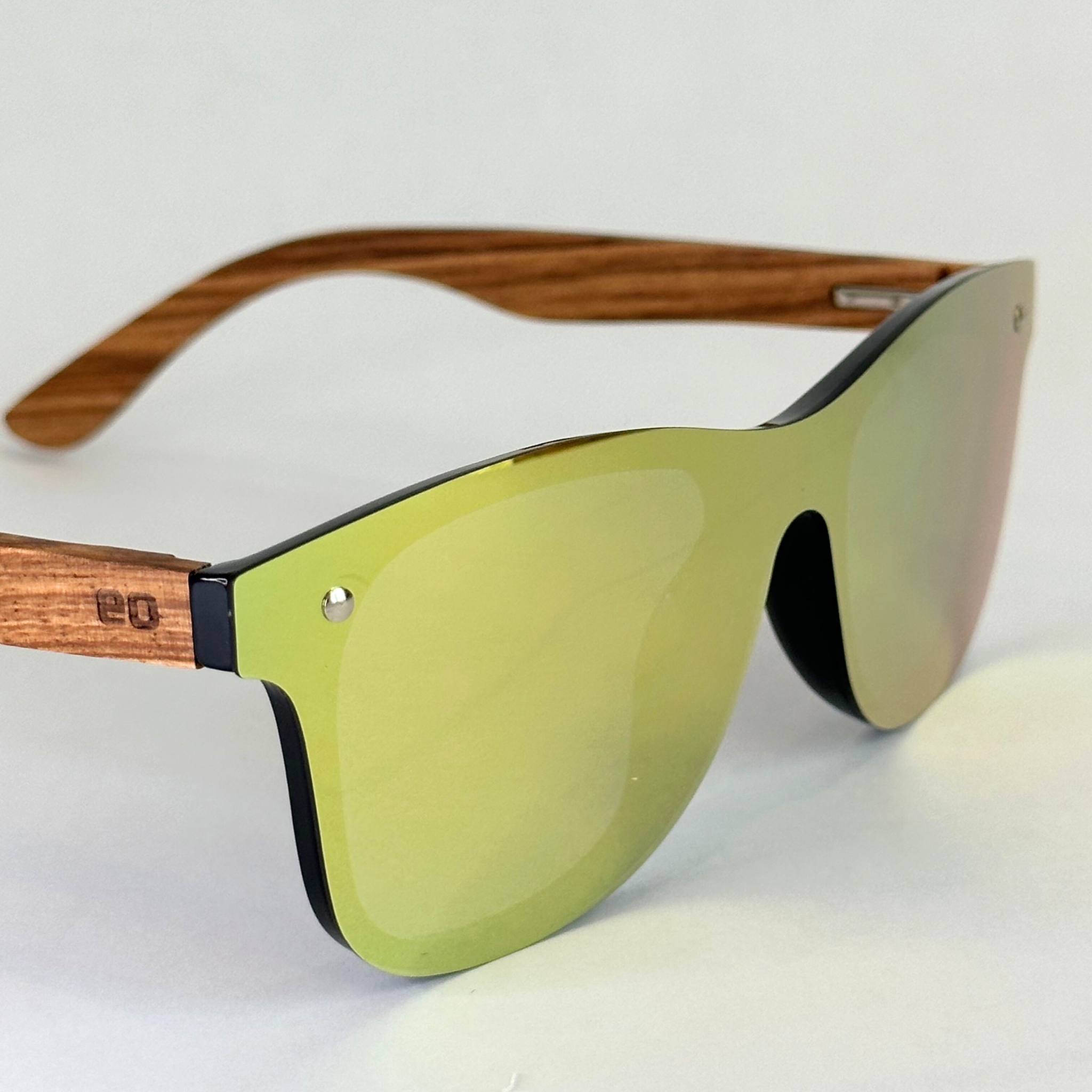 Close-up of Eastern Outer Natalia sunglasses with zebrawood frames, showing their stylish design and detailed craftsmanship.