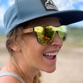 Eastern Outer Natalia sunglasses in zebrawood with dark lenses, showcasing stylish wood frame and modern design.