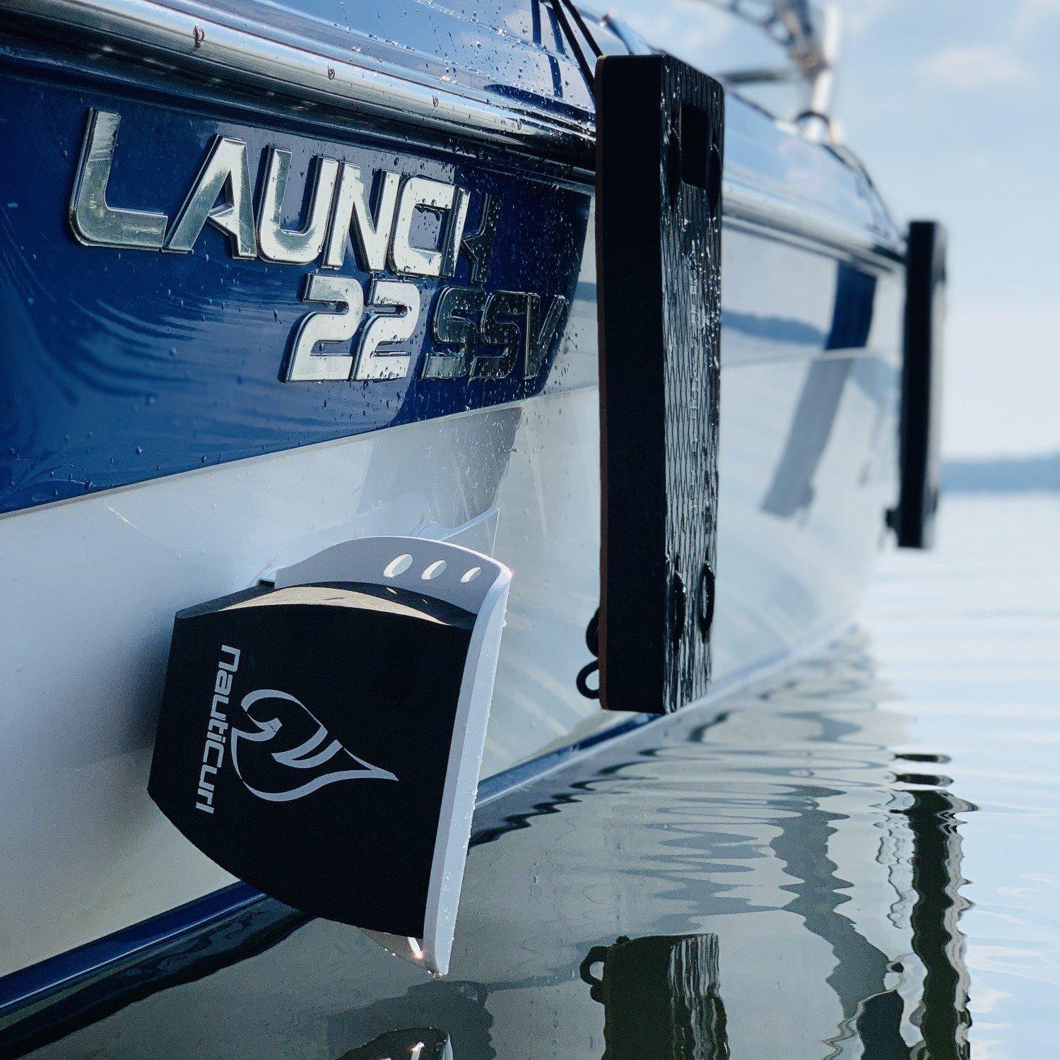 NautiFender flat boat fender by NautiCurl LLC, showing a durable, innovative boat bumper with a sleek design for marine protection.