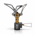 White Near Zero Outdoor Gear Mini Stove showing compact portable design and control knob on a plain background.