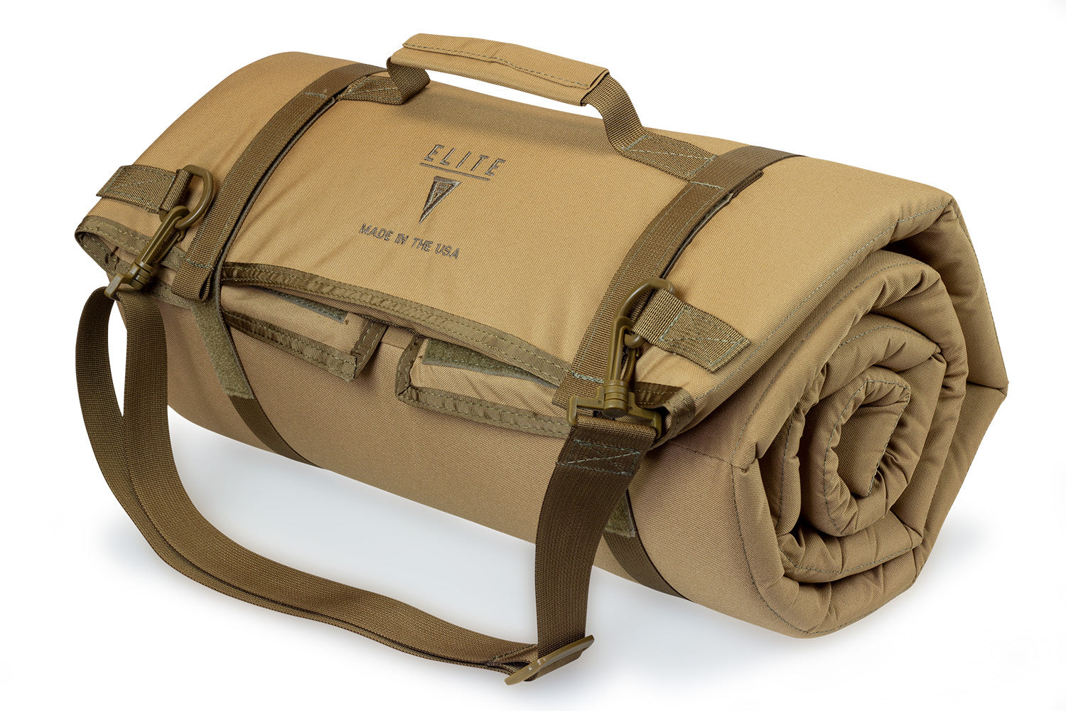 Rolled-up Elite Survival Systems lightweight tactical shooting mat with strap, designed for outdoor shooting and camping.