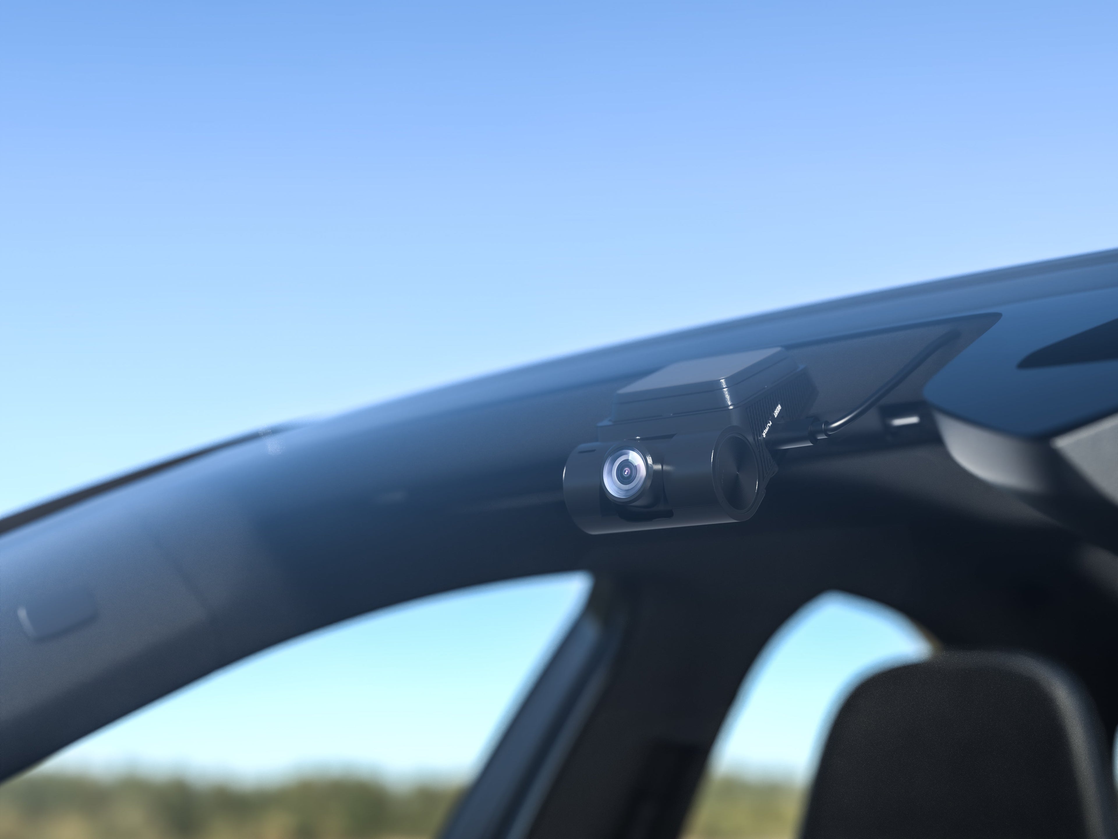 Rexing V1P Flex X4 4K WiFi dual dash cam in black, showing front and rear cameras mounted inside a vehicle.