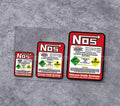 Decor NOS sticker by Bean's Moto Booth featuring vintage-style branding and bold graphics for motorcycle enthusiasts.