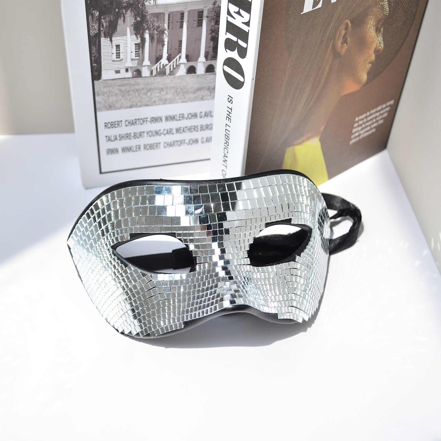 Decorative disco ball helmet by Bean's Moto Booth featuring a shiny, reflective surface and vibrant colors for retro-style decor.