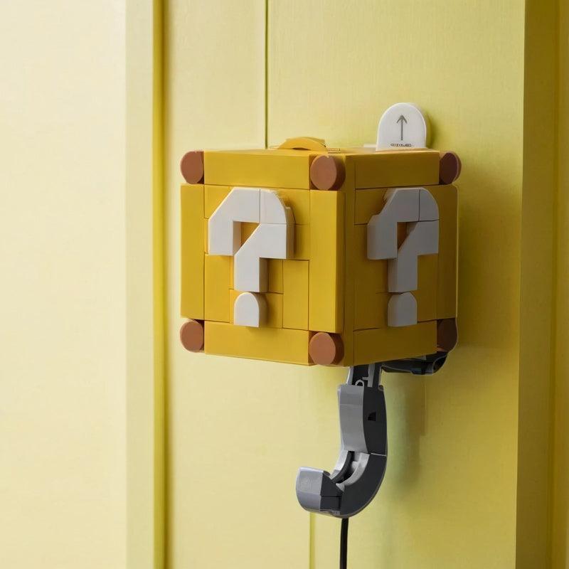 Super Mario-themed motion key hook decor by Bean's Moto Booth featuring a colorful Mario figure for wall display.