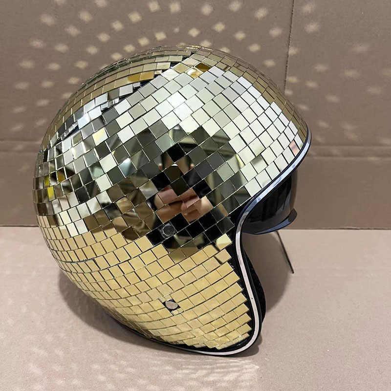 Decorative disco ball helmet by Bean's Moto Booth, featuring a shiny, reflective surface and retro style for party or decor use.