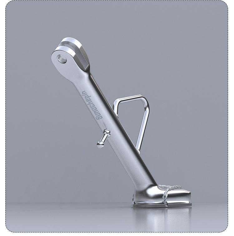Stainless steel flip-flop motorcycle kickstand by Bean's Moto Booth, designed for motorcycle mods, with a sturdy, polished finish.