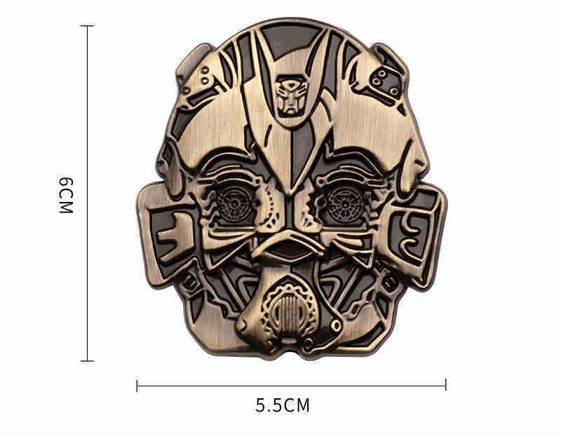 Transformers metal emblem by Bean's Moto Booth, featuring a detailed, metallic Autobot insignia on a sleek surface.