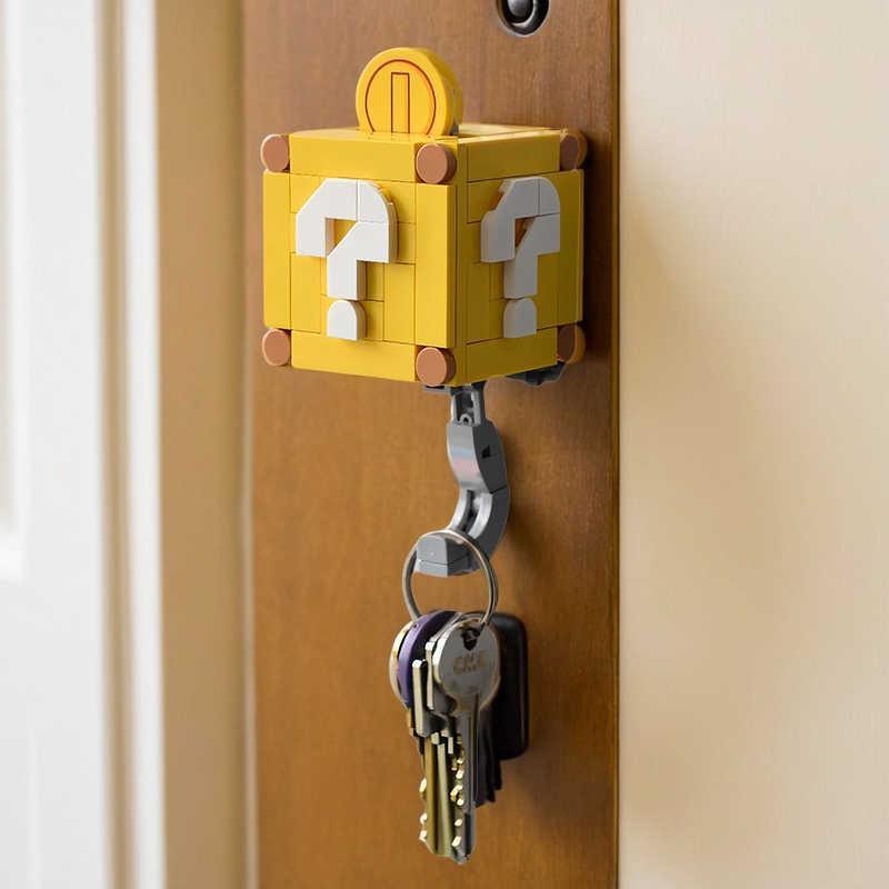 Super Mario motion key hook decor by Bean's Moto Booth featuring a colorful Mario character in a dynamic pose.