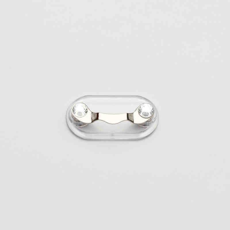 Magnetic eyeglass holder by Bean's Moto Booth, showing a sleek, black metal design with a magnetic clip for easy attachment.