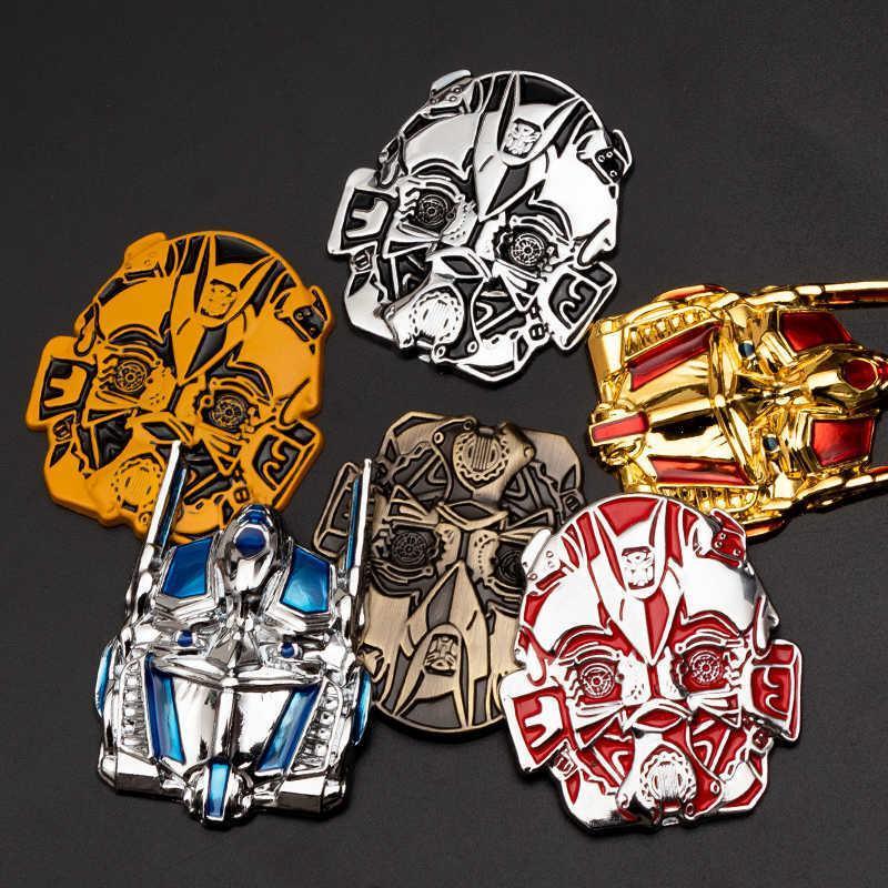 Transformers metal emblem featuring the iconic Autobot logo, crafted by Bean's Moto Booth, on a metallic surface.