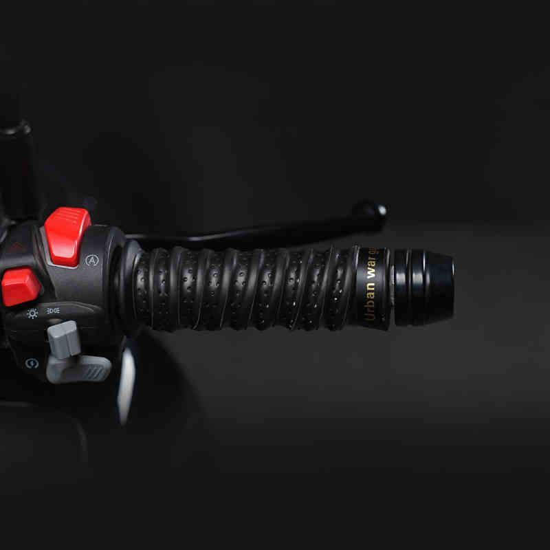 Black motorcycle handlebar grips by Bean's Moto Booth, anti-slip and breathable for secure riding comfort.