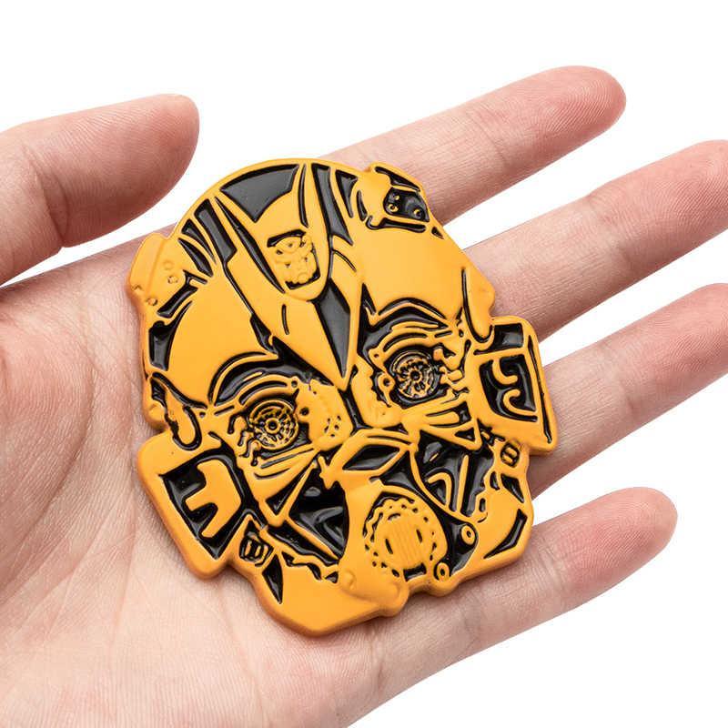 Transformers Metal Emblem by Bean's Moto Booth featuring a detailed metallic Transformer character design.