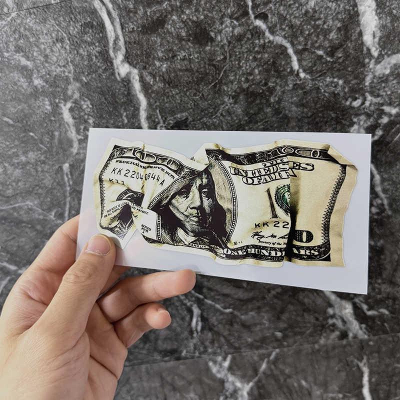 Wrinkled dollar bill sticker for decor by Bean's Moto Booth, featuring a humorous, distressed dollar design.