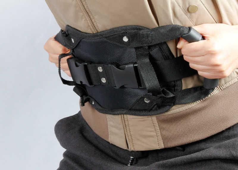 Motorcycle rear seat safety grab handle by Bean's Moto Booth, mounted on a motorcycle seat for passenger support and security.