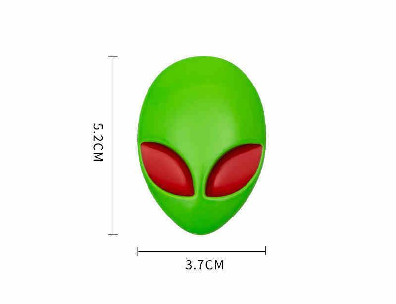 Alien metal emblem with detailed design, featuring a sci-fi inspired alien figure, from Bean's Moto Booth.