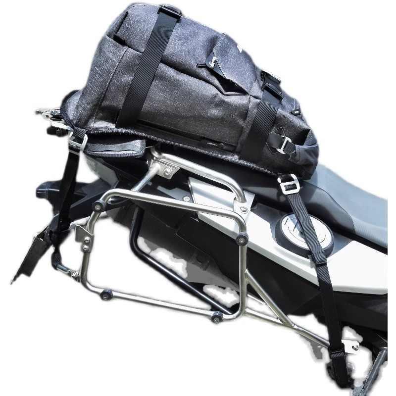 Motorcycle backpack cargo support straps attached to a Bean's Moto Booth motorcycle backpack for secure riding.