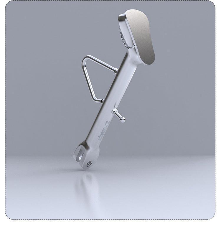 Stainless steel flip-flop motorcycle kickstand from Bean's Moto Booth, designed as a durable motorcycle modification accessory.