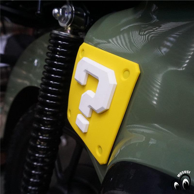 Vintage motorcycle question mark anti-collision decor sticker by Bean's Moto Booth on a surface with visible design details.