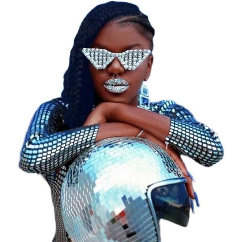 Decorative disco ball helmet from Bean's Moto Booth, featuring a shiny, reflective surface with colorful light patterns.