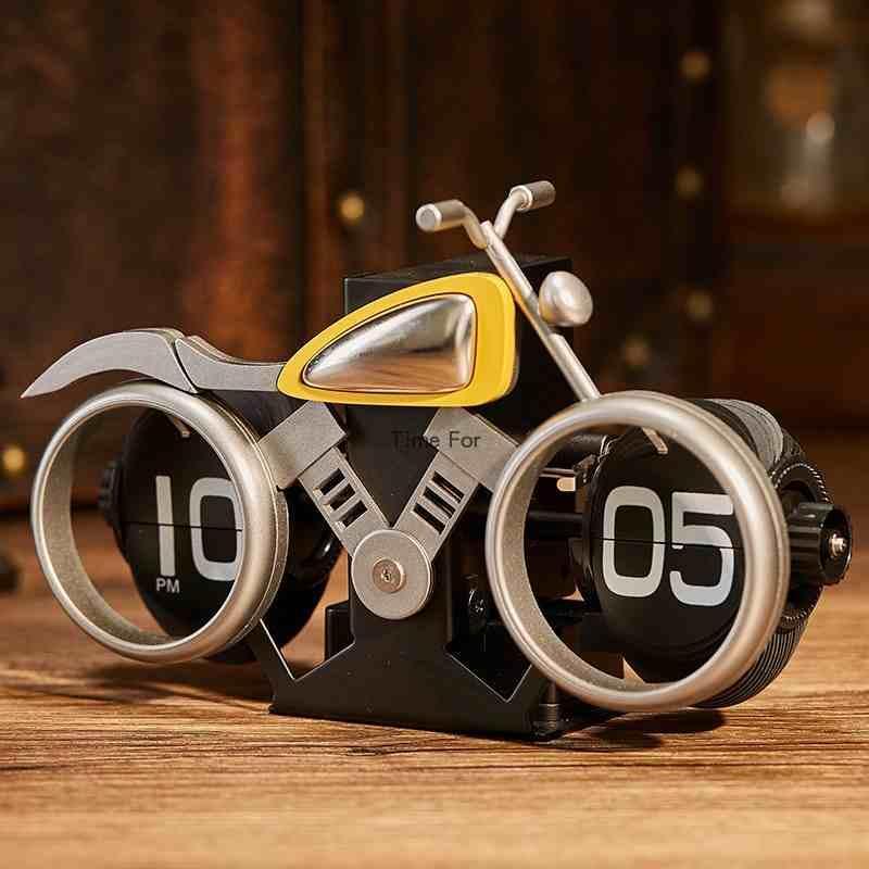 Vintage motorcycle-themed flip clock by Bean's Moto Booth showing a classic design with motorcycle graphics and retro styling.