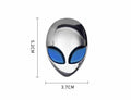 Alien metal emblem by Bean's Moto Booth featuring a detailed alien face design for motorcycle customization.