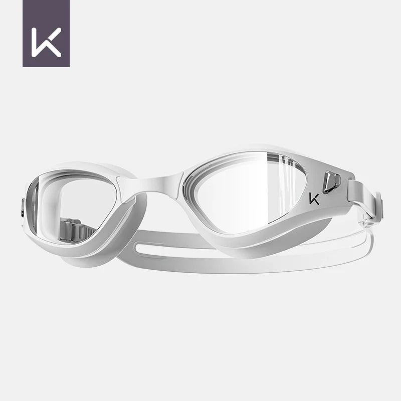 Hendrix Arts waterproof swimming goggles with anti-fog HD lenses, suitable for myopia, worn by a male swimmer with a matching swimming cap