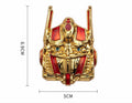 Metal emblem featuring Transformers design by Bean's Moto Booth, with detailed metallic finish and iconic robot imagery.