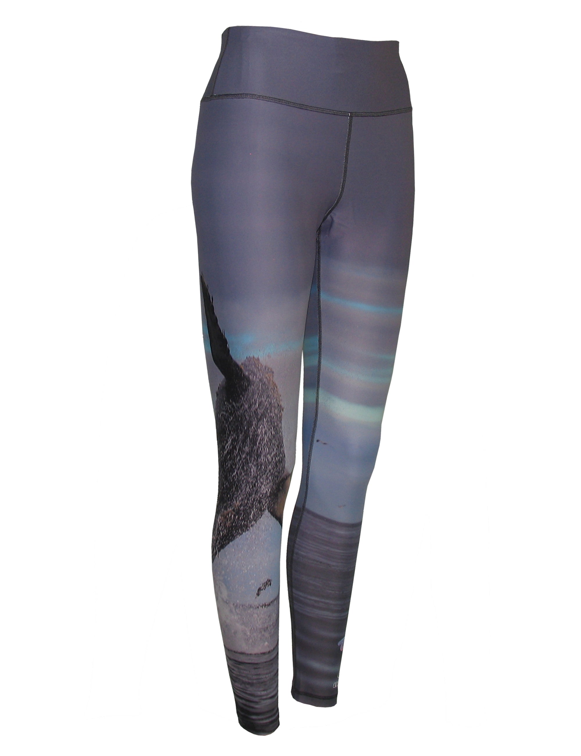 All sport leggings with an ocean whale print pattern from Cognito Brands, featuring a vibrant, ocean-inspired design.