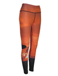 Ocean print patterned all sport leggings by Cognito Brands featuring a vibrant sunset surfer design.