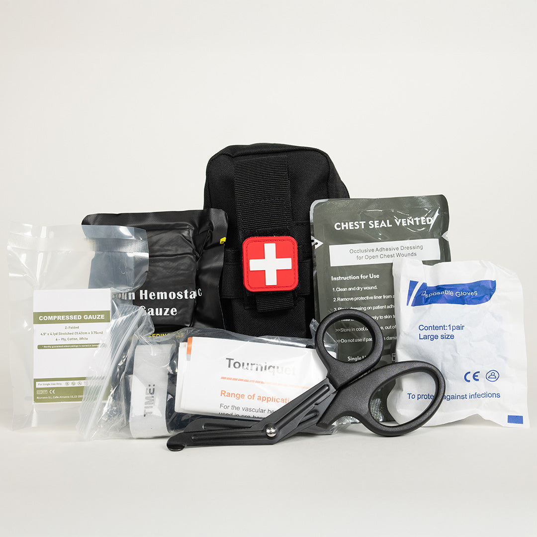 On-Hand First Aid Kit by Emerge Survival showing contents arranged in a compact, organized layout for easy access.