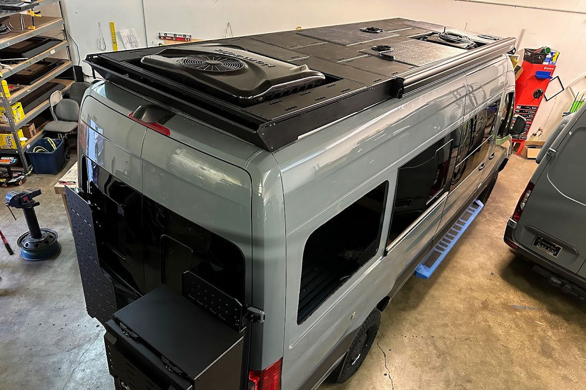 Orion Van Gear Sprinter Roof Deck Panels 2.0 with flush design installed on van roof for added cargo space and utility.