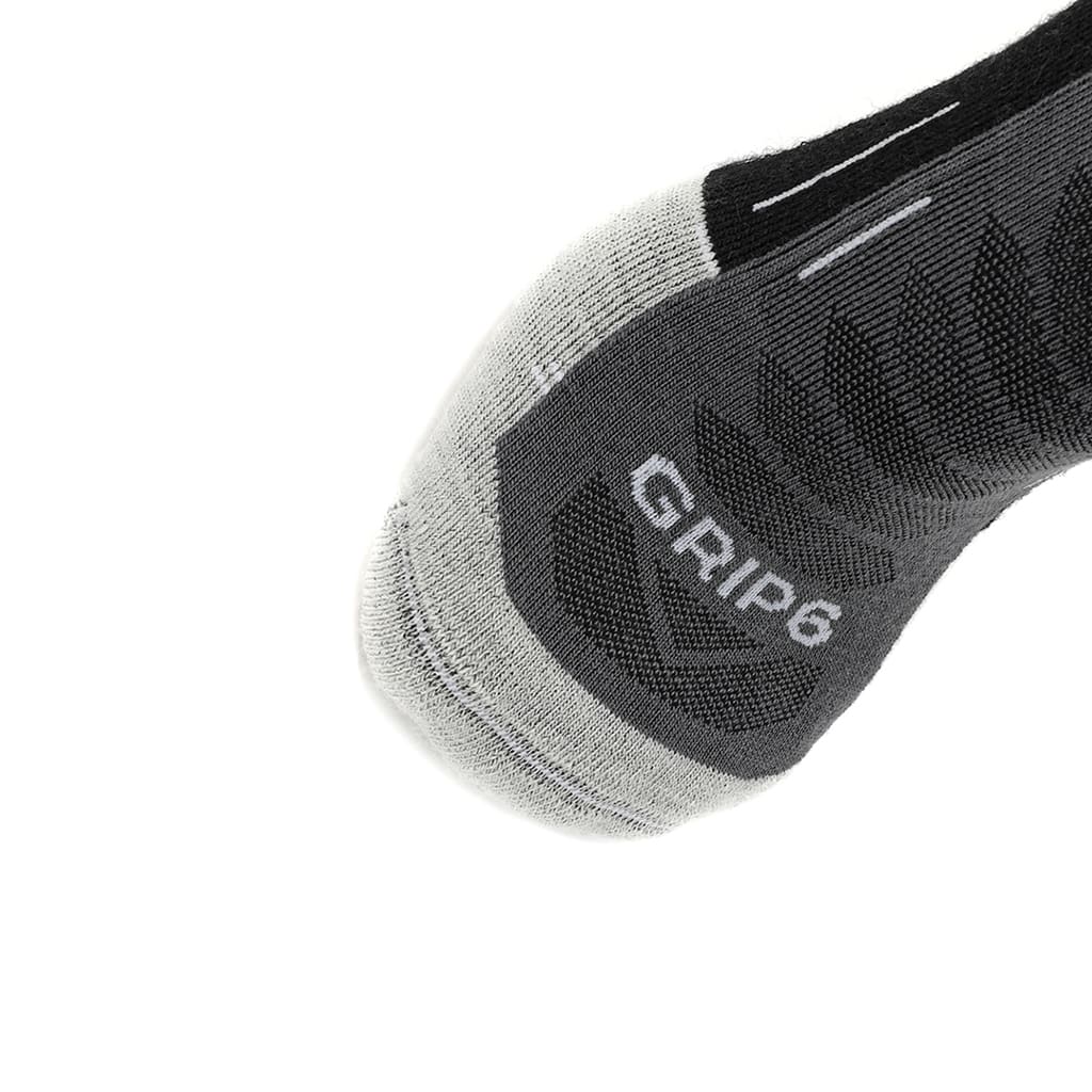 Three pairs of GRIP6 obsidian run ankle midweight merino wool socks, showing close-up view of the toe and fabric texture.
