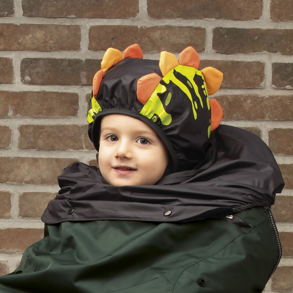 ZEITBIKE Tucano Urbano thermal child bike seat rain cover with hood, featuring a green dino design for outdoor bike rides.