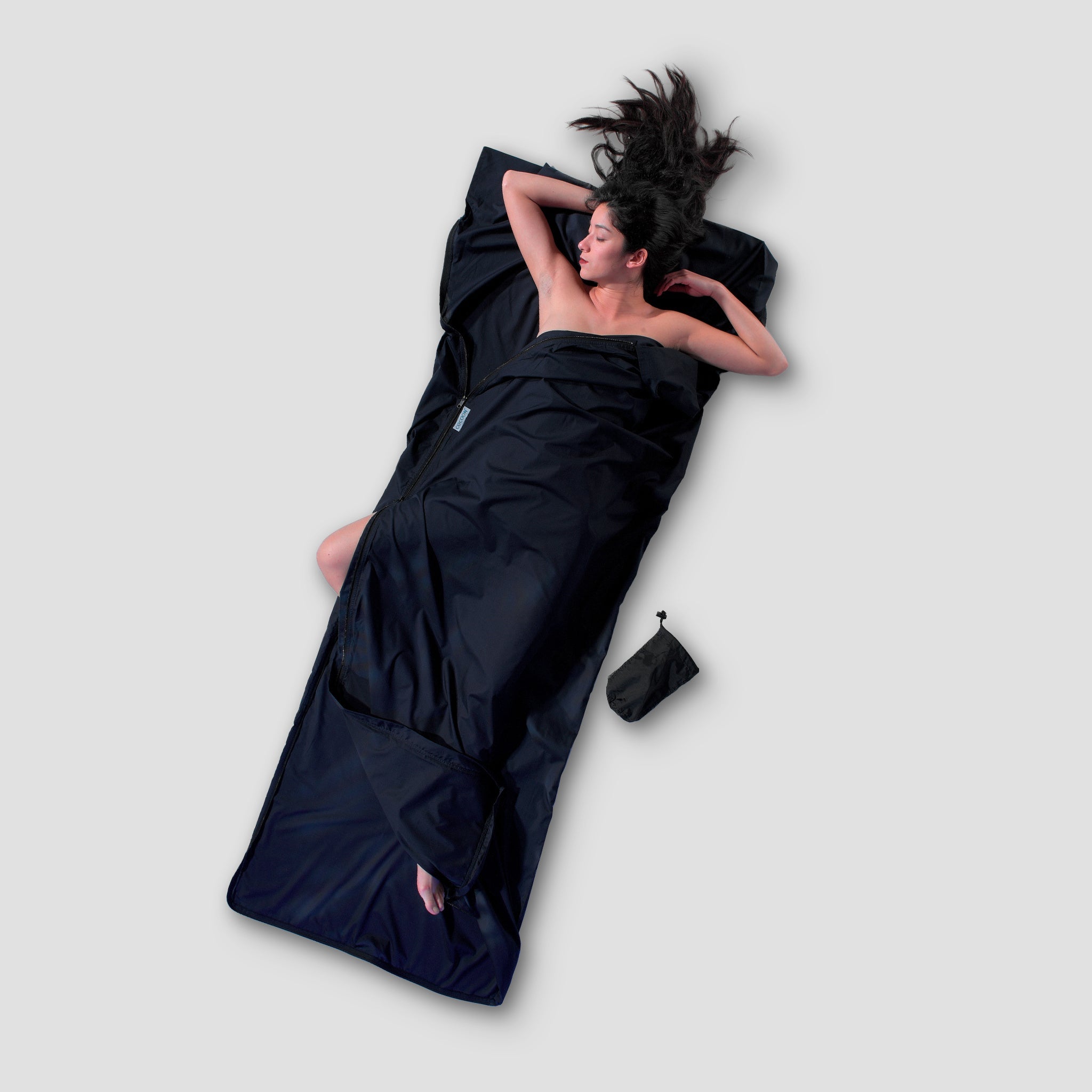 Cocoon TravelSheet™ cotton-poly blend sleeping bag liner laid out flat, showing lightweight, breathable fabric ideal for travel and camping.
