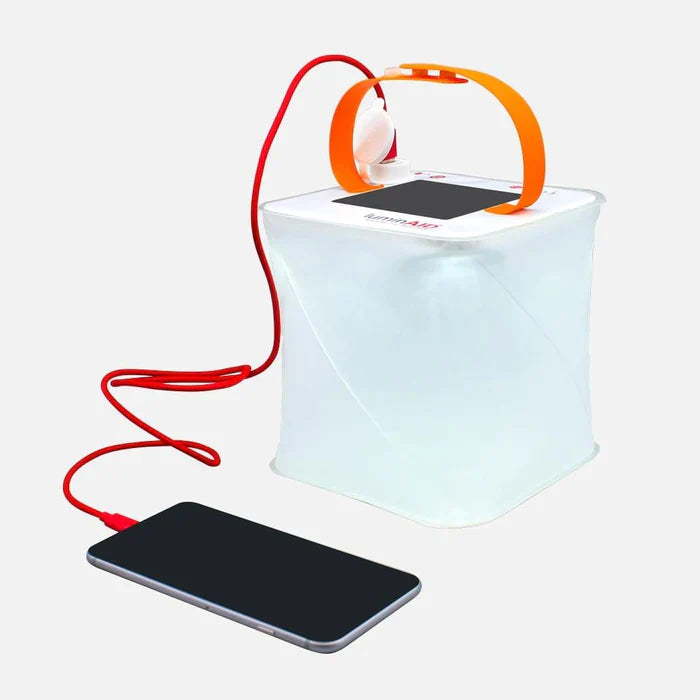 Alpenglow Readiness Supply PackLite Max 2-in-1 Power Lantern on a gray background, showcasing its compact design and features.
