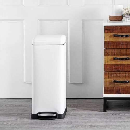 White 8-gallon retro stainless steel step-on trash can by HomePacific for kitchen use, featuring a durable design and foot pedal operation.