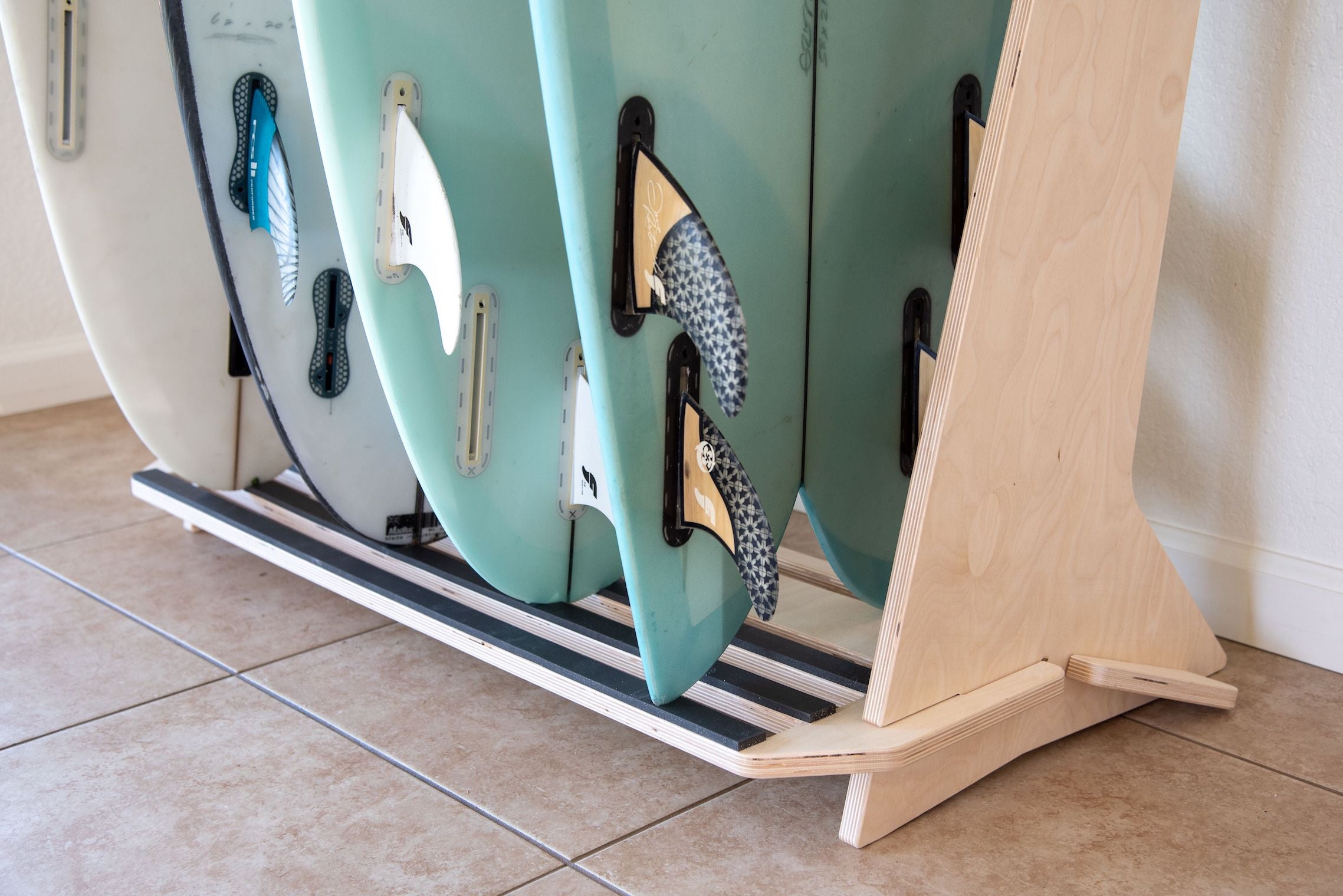 Freestanding Rado Racks Pacifica surfboard rack displaying multiple surfboards in a stylish, sturdy design.