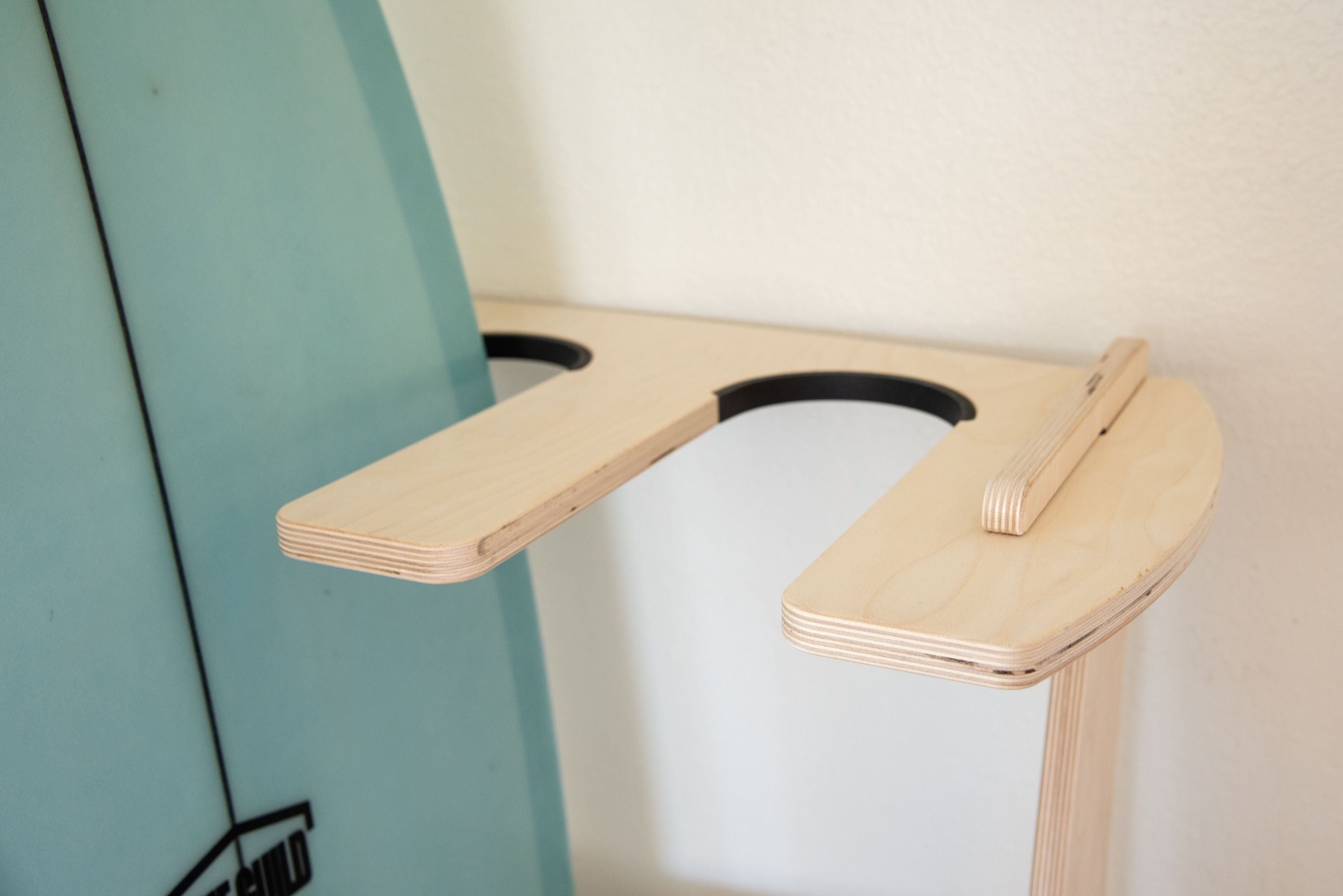 Freestanding Rado Racks Pacifica surfboard rack displaying multiple surfboards in a stylish, modern design.