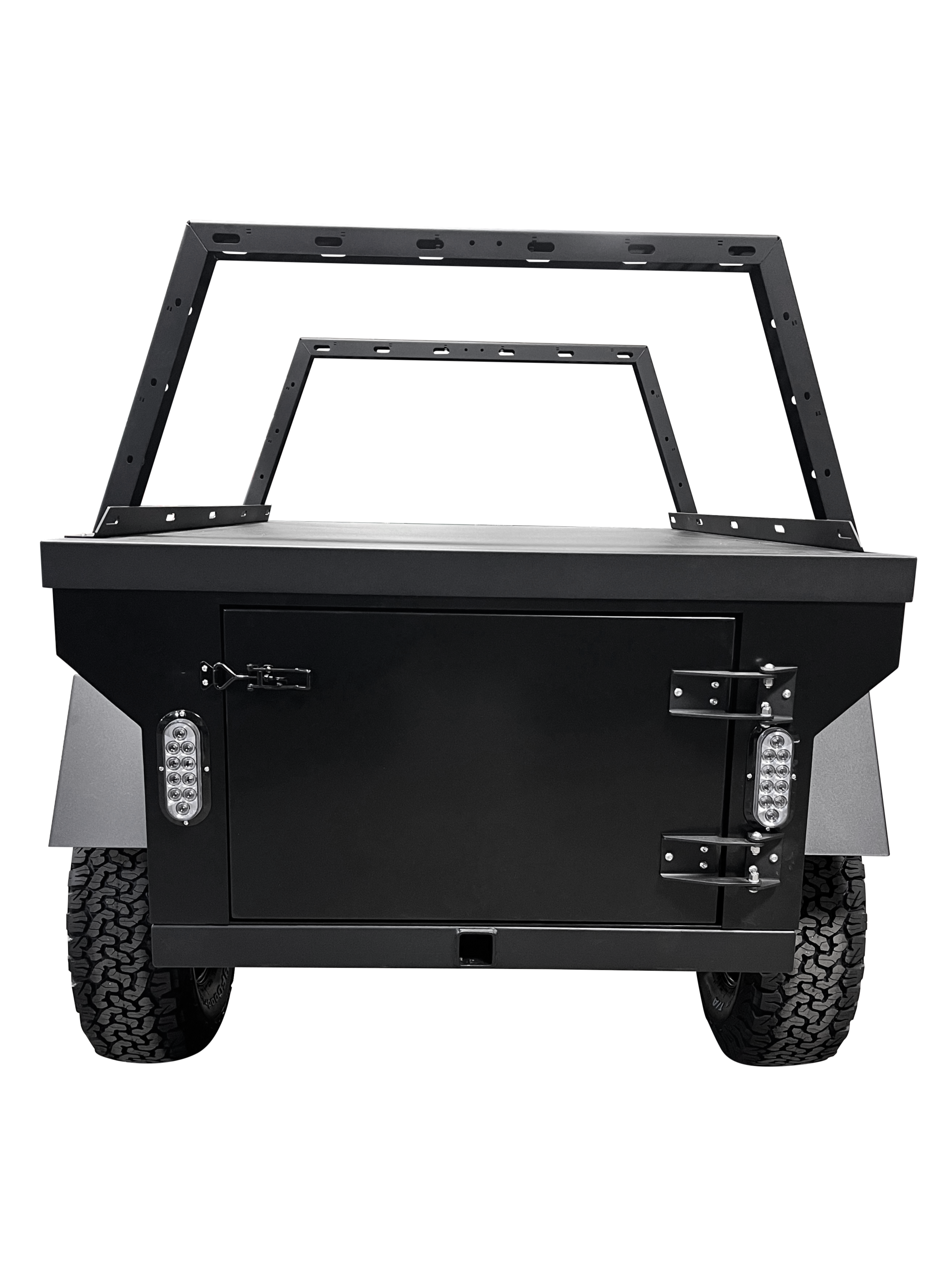 Rustic Mountain Overland PATROL XCT off-road trailer in black, rear view showing rugged design and off-road tires.