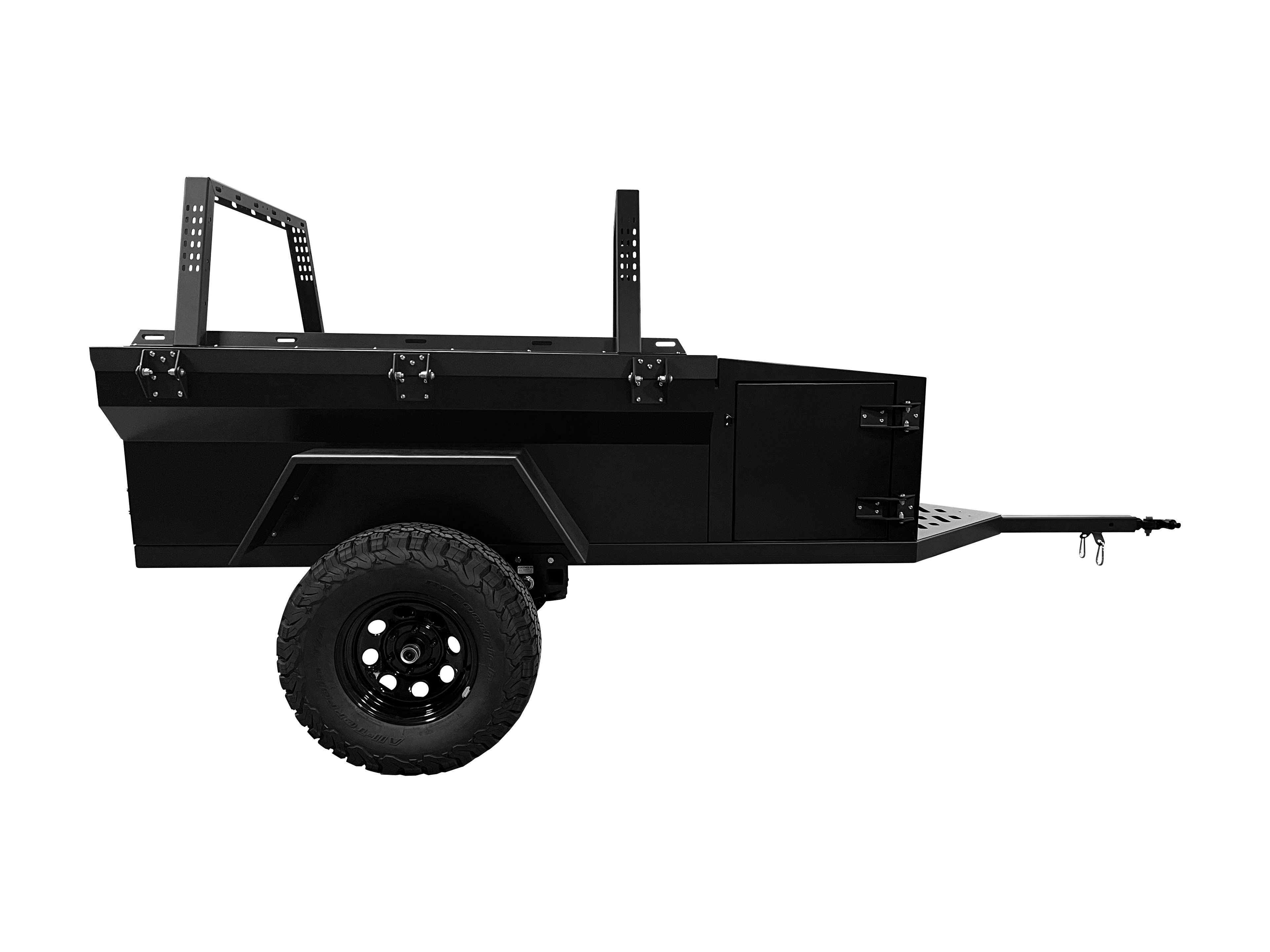 Black Rustic Mountain Overland PATROL XCT off-road trailer shown from the side view, featuring rugged design and off-road capabilities.