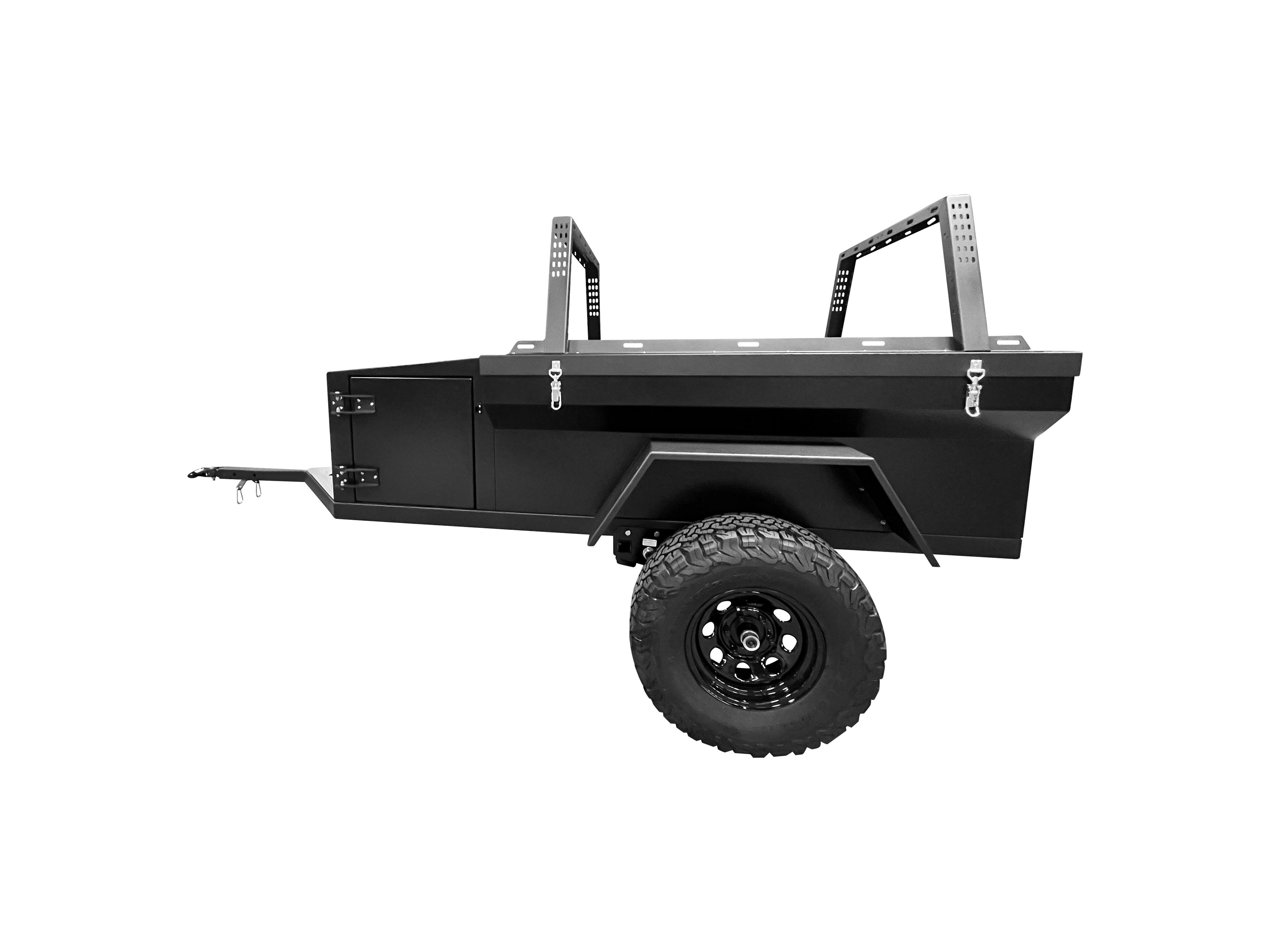 Black Rustic Mountain Overland PATROL XCT off-road trailer viewed from the driver side, showcasing rugged design and sturdy construction.
