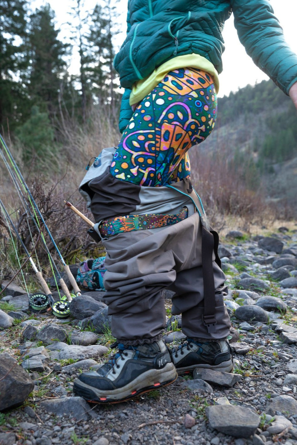 FisheWear Brookie Signature Leggings in black with subtle logo detail, shown on a model, made of stretchy, comfortable fabric.