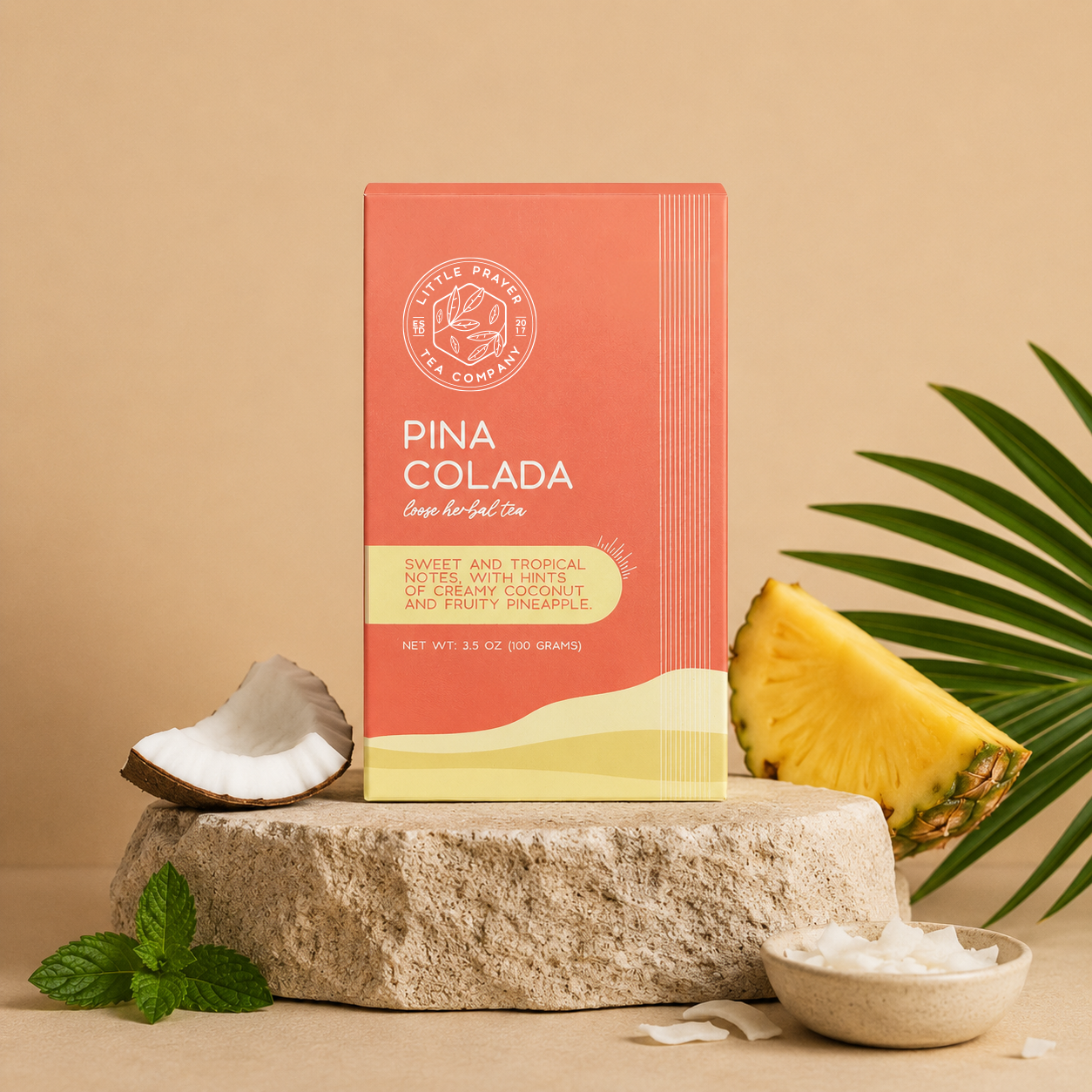 Herbal tea pouch labeled Pina Colada by Little Prayer Tea Company, featuring tropical fruit and coconut flavors in a natural tea blend.