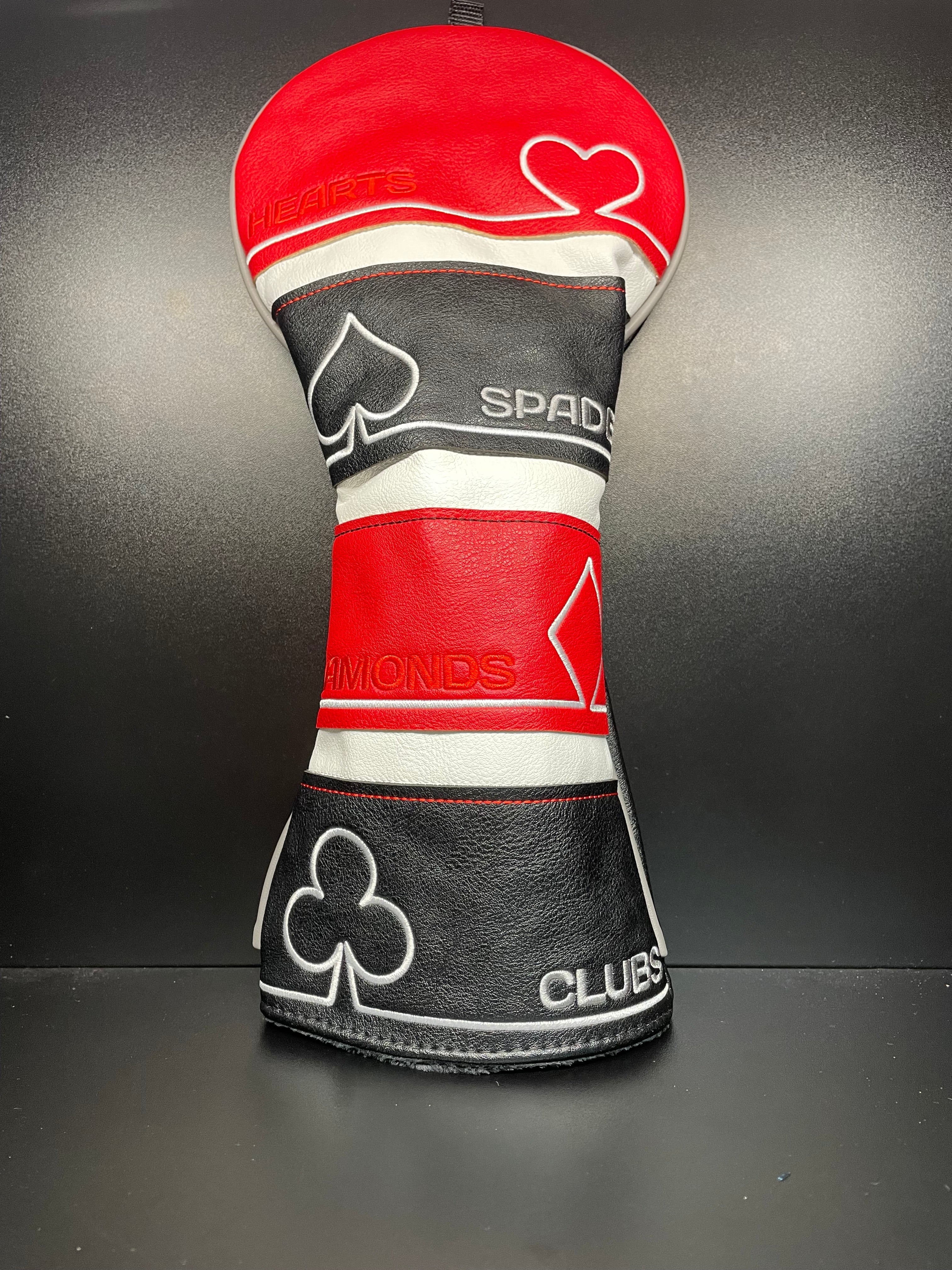 Golf club headcover with playing card suits design by ParWestGolf, featuring spades, hearts, diamonds, and clubs for a unique look.