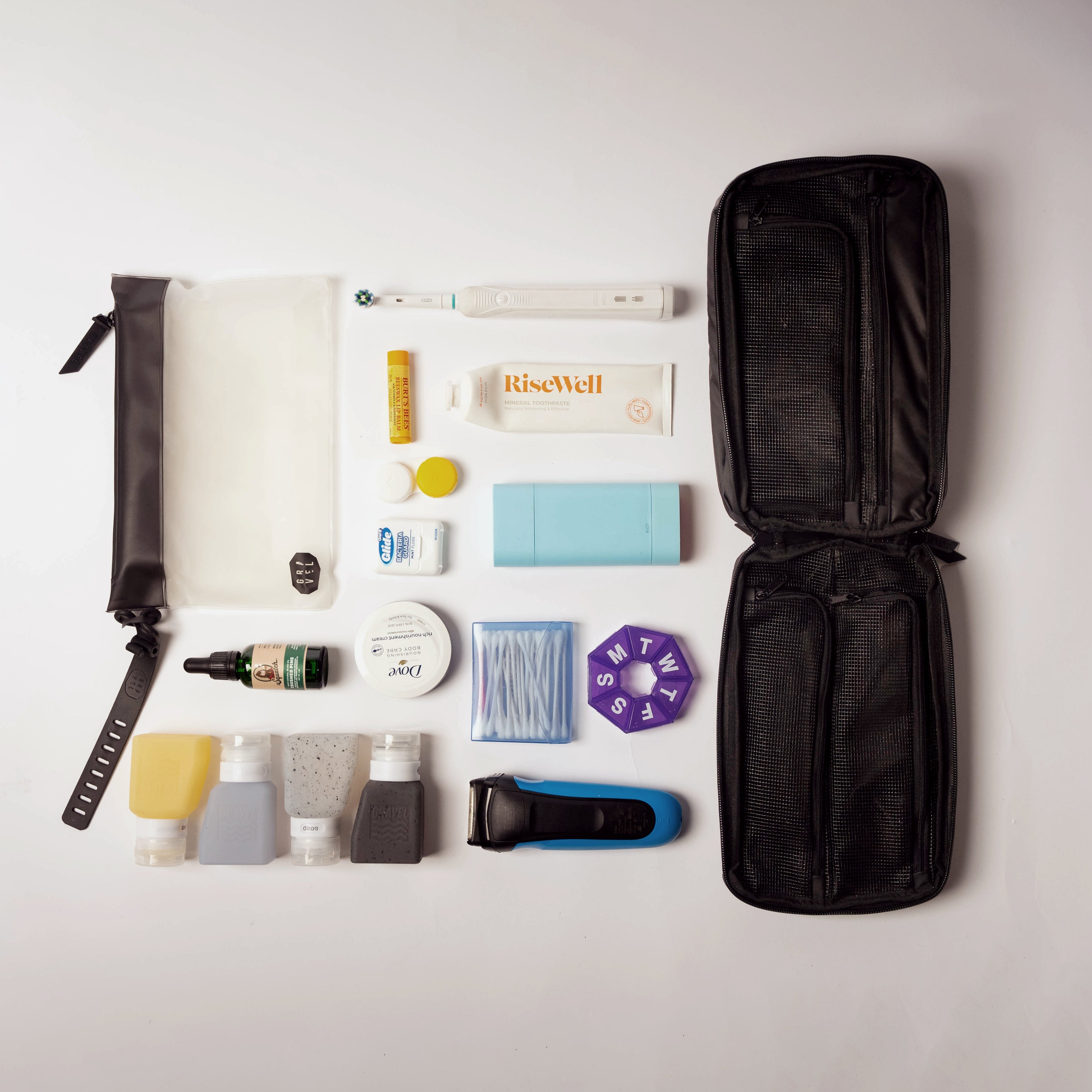 Gravel Plus™ Toiletry Bag in gray with multiple compartments, compact design for travel and personal care organization.