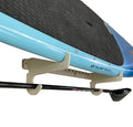 Rado Racks THE PORT paddle board SUP rack mounted on a wall, designed for secure storage of stand-up paddleboards