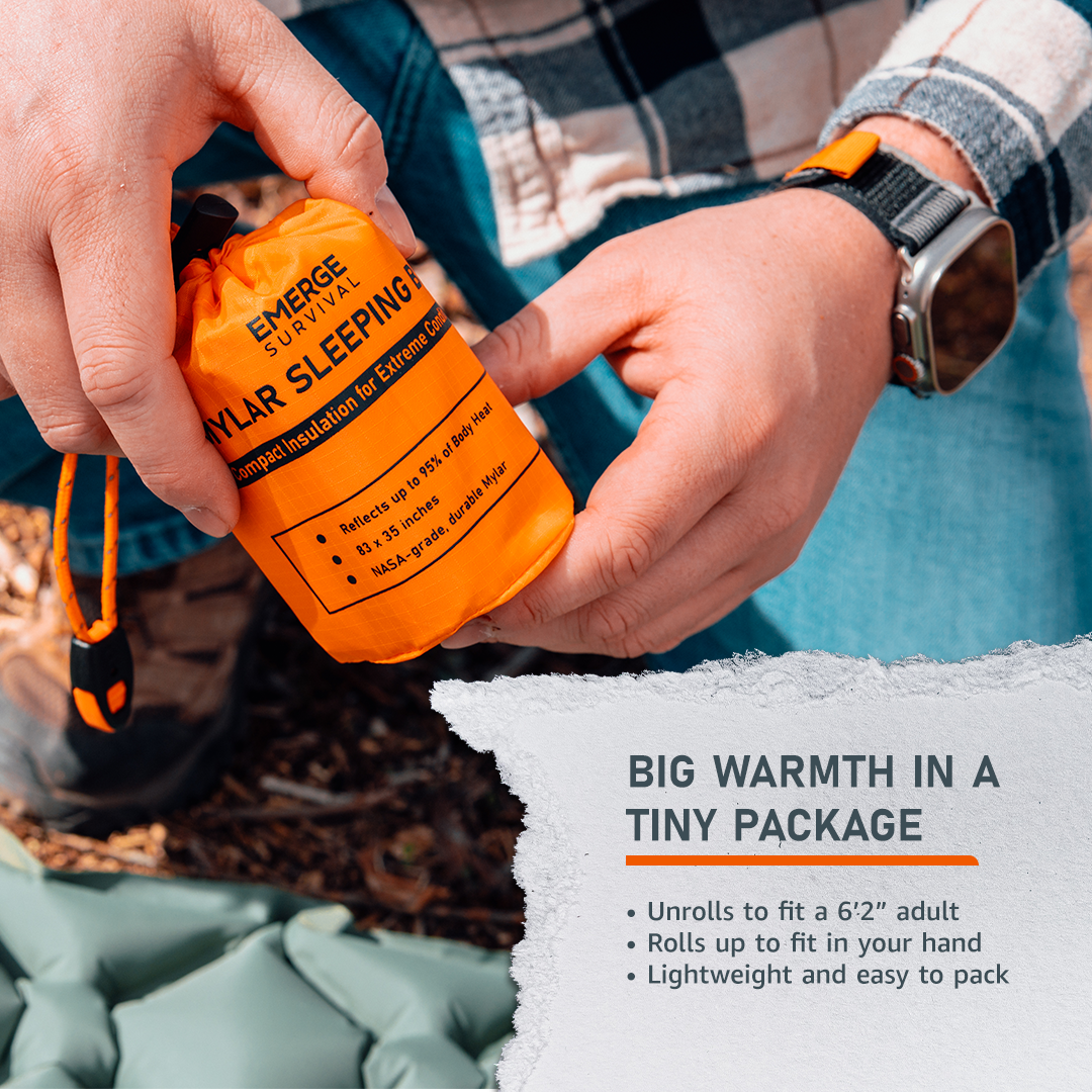 Emerge Survival emergency sleeping bag made of lightweight, durable Mylar material for warmth and safety in survival situations.